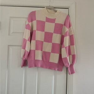 Chic Pink and Cream Checkered Turtleneck Sweater